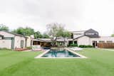 RAM picture windows allow for grand views of this poolside backyard in the heart of Dallas, TX.