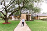 Architect, John Lively, stands in front of this Dallas area home featuring RAM windows and doors.