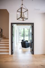 This Dallas-area home includes a layout that is both open-concept but also allows for privacy between rooms with large doorways and bright RAM windows to illuminate the entire home.