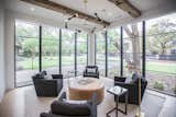 RAM picture windows with modern grids bring a sophisticated finish to this warm and bright sitting room in Dallas, TX.
