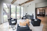 RAM picture windows with modern grids bring a sophisticated finish to this warm and bright sitting room in Dallas, TX.