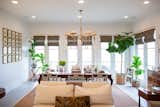 RAM white picture windows bring welcoming light into this dining area.