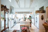 This bright farmhouse kitchen with high ceilings and shiplap is made complete by the aluminum white RAM windows with classic grids.
