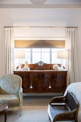 RAM white picture windows bring welcoming light into this country chic sitting room.