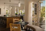 Nook table and kitchen shot leading to the outdoor area.
