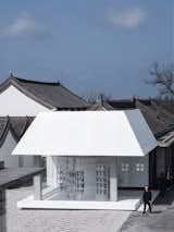 View of White Is Good Shop against back drop of the Weipo village