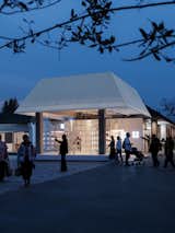 Street view of White Is Good Shop at night