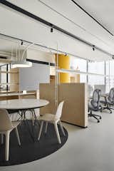 Workstations :

North side for workstations to capitalise on the soft light, incorporating full-length glazing. Unlike traditional corporate setups, the best view here is reserved not for the director, but for the team.