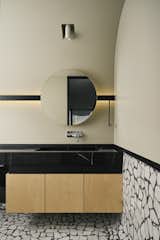 Washroom : 

Walls fnished in white marble mosaic 