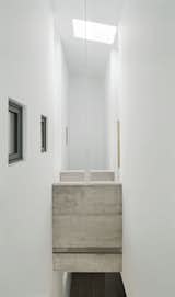 View of the double volume from the main bathroom "bridge-shower" of the bridge that connect the "wet spaces" (bathrooms) with the "dry-night" area (bedrooms and studio).
