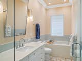 En-suite Bath Meticulously Designed to Compliment Guest Bedroom