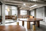 View of OPC TV looking east. In creating a dynamic workspace for OPC Productions, we curated a spectrum of environments, spanning from a communal lounge to private meeting rooms, sound-proof booths, and adaptable work surfaces for hoteling.