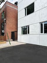 Detail of a building corner as a collision of materials.