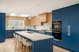 The addition of two skylights floods the kitchen with abundant natural light, creating a healthy and airy atmosphere.