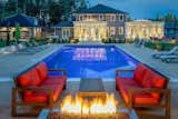 The aligned view from the pool house to the living room addition.