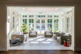 A view from the existing living room into the new Orangery addition sitting area.