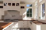 An interior view of the Kitchen Orangery addition with solid walnut countertops.