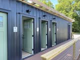 Restroom container with doors open