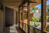 Open corridor first level overlooking the central patio. Vernacular expression 