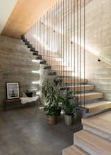 steel and oak stairway to lower bedroom and Media area