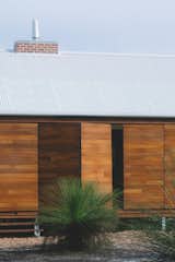 Spotted Gum bifold doors to protect from rain, wind, and bushfire. 