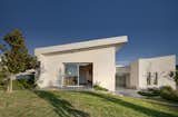 The house was designed as a single concrete structure, with integral shading element