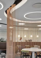 Metal/mesh curtains used to create a modular space