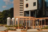 New square arrangement - social small architecture, and in the background entrance to the building