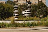 Ventilators and sculptures / parking area 