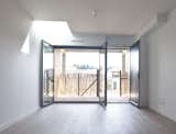 Duplexes with exterior walkway and attic spaces on the upper floor