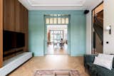 The cabinet element is part of the original house from the 1900s we wanted to keep it and elevate it by brining some parts tot he 21sr century and also highlighting it in the green color