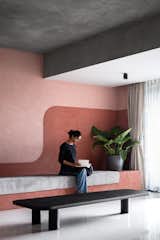 
The Living Room: A Symphony of Connectivity
 A long bench in the living room is a nod to their old house in Orissa, where family members 
would gather on the veranda to chat and feel at home. 