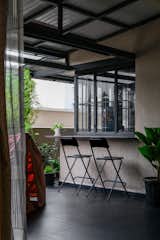 The kitchen features a beautiful corner window that opens up into a large 
balcony, making the space airy and bright. The platform doubles as a breakfast 
counter, perfect for casual family meals.

