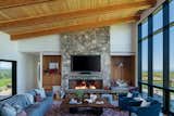 The living room features and extra large fireplace.