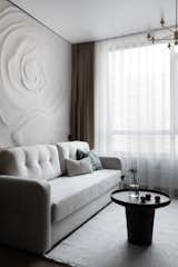 The natural elegance of the plaster rose inspired a vibrant color palette that forms the foundation of
the design. The living room’s light, airy tones and rich textures complement the rose, highlighting its
presence without overpowering the room. This balance of subtlety and vibrancy reflects the
refinement and quiet strength of the homeowners.
