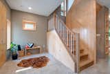 Wellness Space w/ Integrated Yoga Wall and embedded maple floor slab