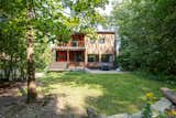 Rear Elevation w/ reclaimed Douglas Fir siding and porch structure from the Welland Canal.