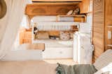 A set of bunks with some fun stairs to climb.