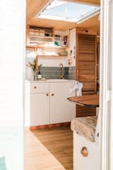 A homely kitchen with tiles and all.