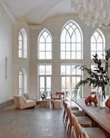 Living-dining room. 

Sculpture by Ivan Belyaev, Art Human Design Gallery. Armchair by From Design. Sconce by DCW Editions.