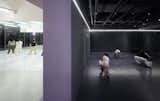Two studios’ spaces are contrasted in a striking black-and-white juxtaposition