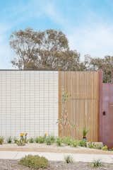 Handmade La Paloma Grande Miro bricks by Austral Bricks contribute texture and depth to the copper exterior of The Torquay Garden House By Lifespaces Group