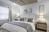 Primary Bedroom with burled wood nightstands