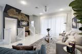 Living Room with view of wood installation on facing walls.