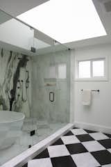 Ensuite- the butterfly marble slab pattern naturally decorated the bathroom without any add-ons.