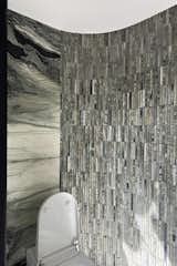 Ensuite- panda green fluted 3D-tiles reflected lights and created an interesting space with irregular patterns.
