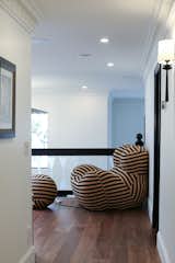 Upper Floor Hallway- a modern reading corner for an individual to relax.