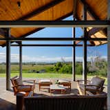 The roof structure is made of glulam beams with locally sourced Cook Pine as the roof decking and interior ceiling.