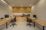 Light wood veneers create a peaceful, focused environment in the accounts room.