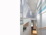 Staircase view toward East, translucent railing diffuses light